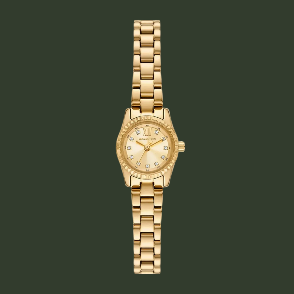 A gold-tone Michael Kors analog watch with a matching metal link bracelet, featuring a gold dial with crystal hour markers and a crystal-encrusted bezel, shown against a plain white background.