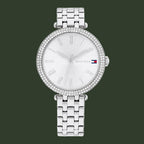 Silver watch with gemstone accents on a white background