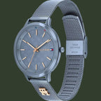 A Tommy Hilfiger women's stainless steel watch with a gray dial, gray mesh strap, and rose gold-tone hands and markers.