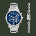 Silver watch and bracelet with blue face on a white background
