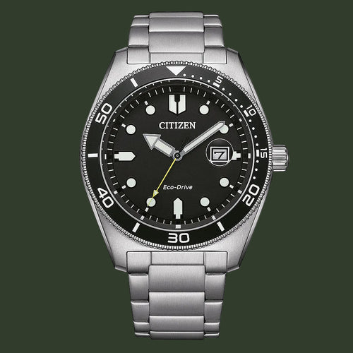 Citizen Eco-Drive stainless steel watch with a black dial, black rotating bezel, silver-tone case, and integrated link bracelet on a white background.