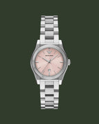 Silver watch with a pink face on a white background