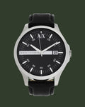 Black Armani Exchange watch on a white background