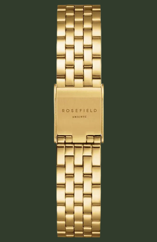 A gold-tone stainless steel link watch band with a rectangular clasp engraved with 'ROSEFIELD ANHANT' in black, shown against a plain white background.