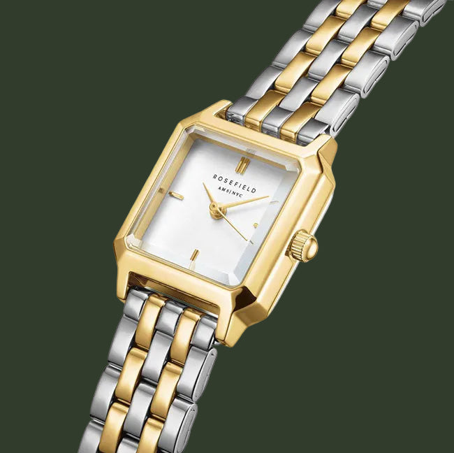 A Rosefield women's watch featuring a gold-tone rectangular case, a white dial with gold-tone hands and indices, and a two-tone stainless steel and gold link bracelet, shown on a plain white background.