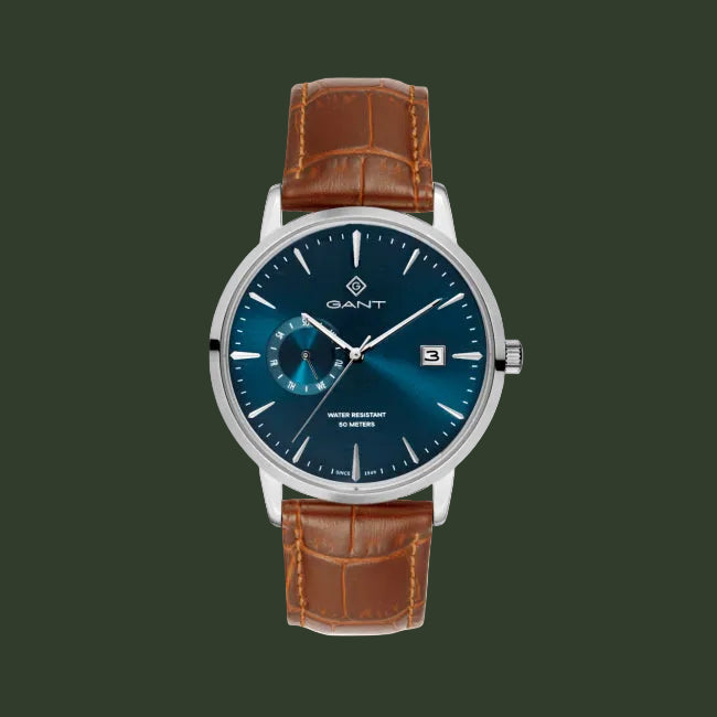 A GANT men's analog watch featuring a blue gradient dial, silver-tone stainless steel case, and a brown leather strap with an alligator pattern.