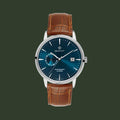 A GANT men's analog watch featuring a blue gradient dial, silver-tone stainless steel case, and a brown leather strap with an alligator pattern.