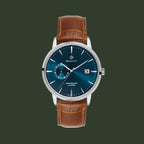 A GANT men's analog watch featuring a blue gradient dial, silver-tone stainless steel case, and a brown leather strap with an alligator pattern.