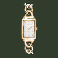 A GANT women's watch featuring a rectangular gold-tone case, a white dial with gold-tone hands and indices, and a matching gold-tone chain bracelet with curb links, shown against a solid white background.