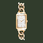 A GANT women's watch featuring a rectangular gold-tone case, a white dial with gold-tone hands and indices, and a matching gold-tone chain bracelet with curb links, shown against a solid white background.