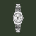 A silver-tone stainless steel watch with a fluted bezel, silver link bracelet, and a white dial featuring a date window and black hands.