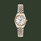 Two-tone watch with silver and gold bracelet on a white background