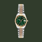 A GANT men's watch featuring a two-tone silver and gold stainless steel link bracelet, a fluted gold bezel, and a deep green dial with a date window.