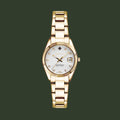 A GANT women's watch featuring a gold-tone stainless steel link bracelet, a fluted bezel, and a white dial with crystal hour markers and a date window.