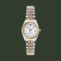 A GANT women's two-tone stainless steel and gold watch with a white dial, featuring a date window at 3 o'clock and a matching two-tone link bracelet.