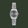 A GANT men's watch featuring a silver stainless steel link bracelet, a fluted bezel, and a dark gray dial with a date window.