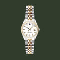 A GANT women's watch featuring a two-tone silver and gold stainless steel link bracelet, a silver case, and a white dial with gold accents.