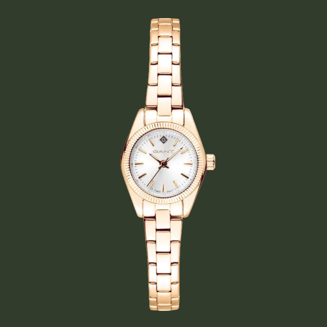 A women's analog watch with a rose gold metal bracelet, a fluted bezel, and a white dial with gold-tone hands and hour markers. The brand name 'G-LORAL' is visible on the dial.