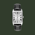 A Cartier wristwatch with a rectangular silver-tone case, a white dial with black Roman numerals, and a black alligator-textured leather strap, shown against a plain white background.