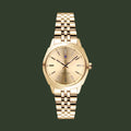 Gold watch with a white background
