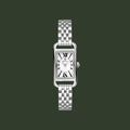 A silver-tone rectangular women's watch with a matching metal link bracelet, featuring a white dial with black Roman numerals and a small Graft logo at the center.
