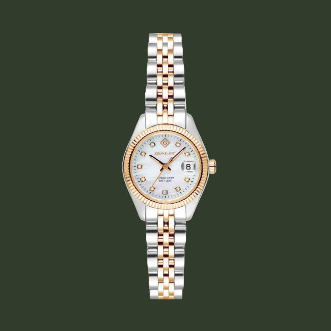 A women's two-tone stainless steel and rose gold watch by Rains, featuring a white dial with crystal hour markers and a date window at the 3 o'clock position.