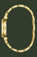 Gold-tone metal watch band shown from the side profile against a solid white background.
