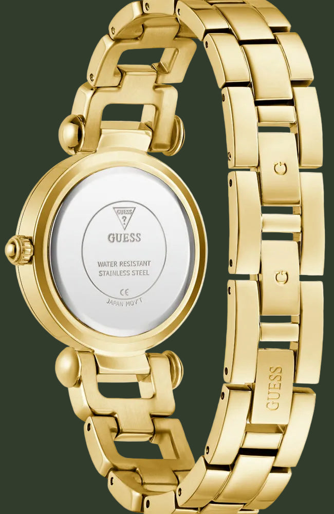 Gold-tone stainless steel watch with a round case and matching link bracelet, shown from the back with the GUESS logo visible on the inner dial and bracelet.