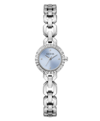 A GUESS women's analog watch with a silver-tone metal link bracelet, a round bezel set with small clear stones, and a light blue dial.