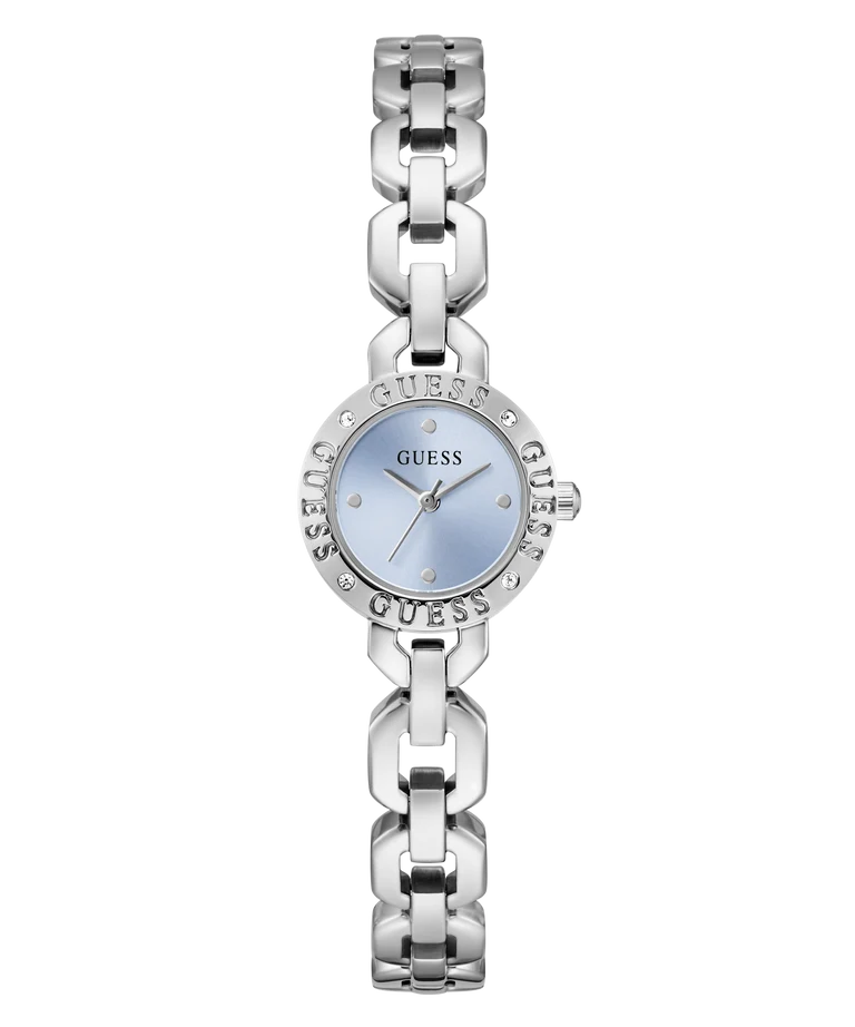 A GUESS women's analog watch with a silver-tone metal link bracelet, a round bezel set with small clear stones, and a light blue dial.