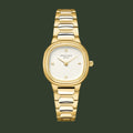 Gold watch with a white face on a light beige background