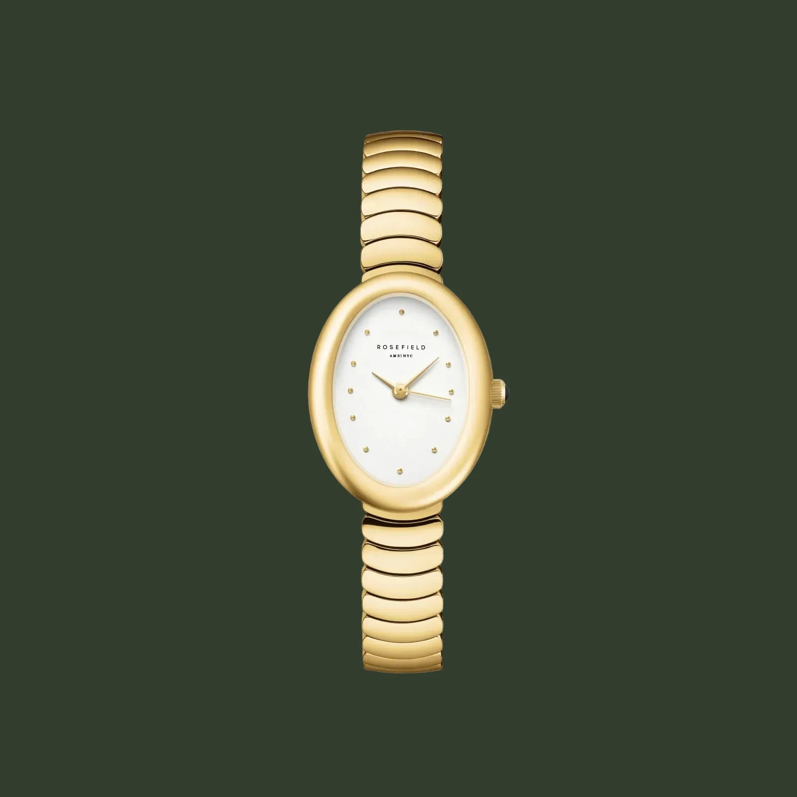 Gold watch with a white face on a light gray background