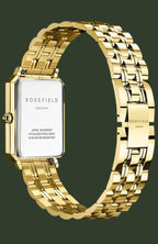 Rosefield Astyc watch with a gold-tone rectangular case and a matching gold-tone link bracelet, shown on a light cream background.