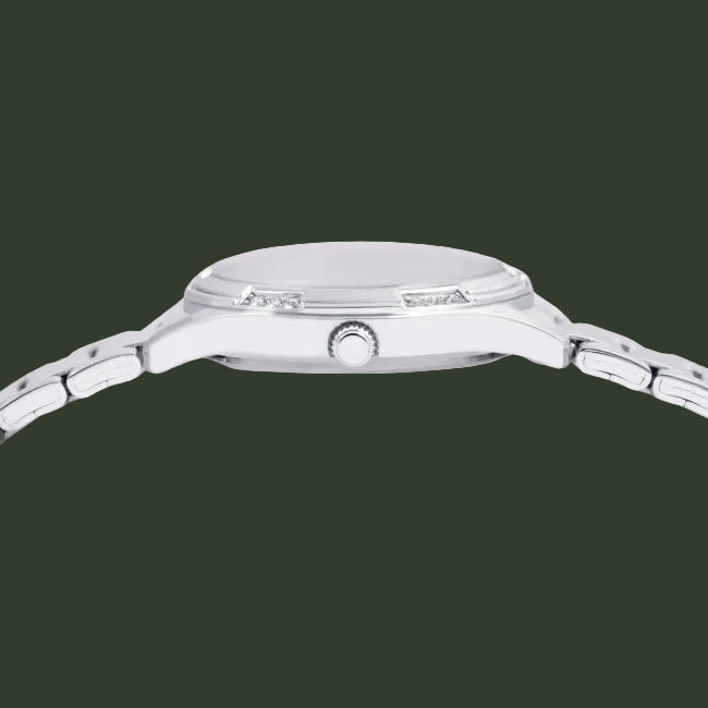 Close-up side view of a silver stainless steel watch with a matching metal link bracelet, featuring a textured crown guard and polished bezel on a white background.