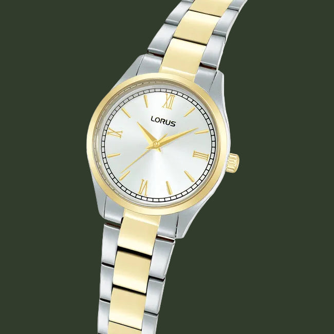 Two-tone silver and gold watch with white face on a white background