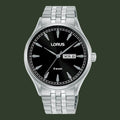 A Lorus men's analog watch with a silver stainless steel case and link bracelet, featuring a black dial with silver-tone indices and hands, a day and date window at 3 o'clock, and '5BAR' printed below.