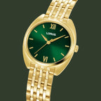 A Lorus women's watch featuring a polished gold-tone metal case and integrated link bracelet, paired with a vibrant green sunburst dial and gold-tone Roman numerals.