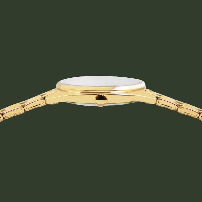 Close-up side view of a gold-tone watch with a round silver dial and matching gold-tone metal link bracelet on a white background.