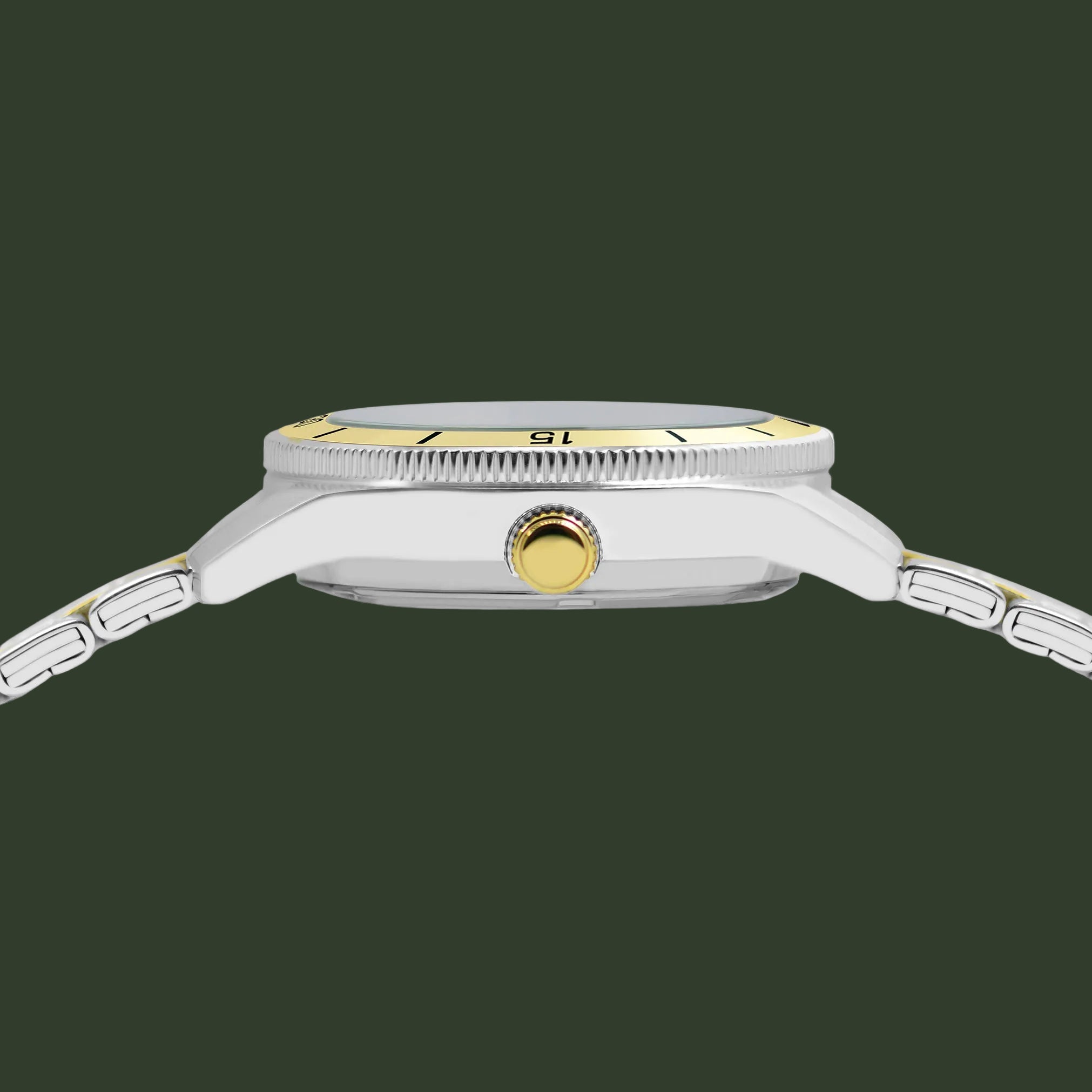 Close-up side view of a two-tone stainless steel and gold watch with a metal link bracelet on a white background.