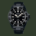 A Seiko Diver's 200m watch with a black resin case and integrated link bracelet, featuring a black dial with white luminous markers and hands.