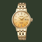 Gold Seiko Presage watch on a white background