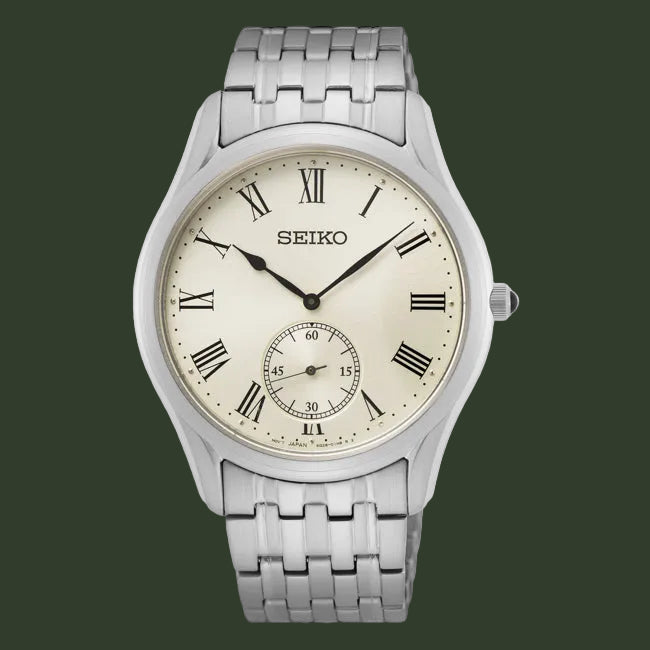 Silver Seiko watch with a cream face on a white background