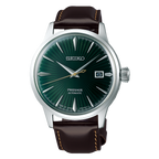 A Seiko Presage Automatic watch with a dark green sunburst dial, silver-tone stainless steel case, and a dark brown leather strap with light tan stitching, shown on a plain white background.