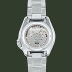 Silver Seiko watch with mechanical components on a white background