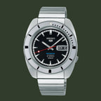 Silver Seiko watch with black face on a white background