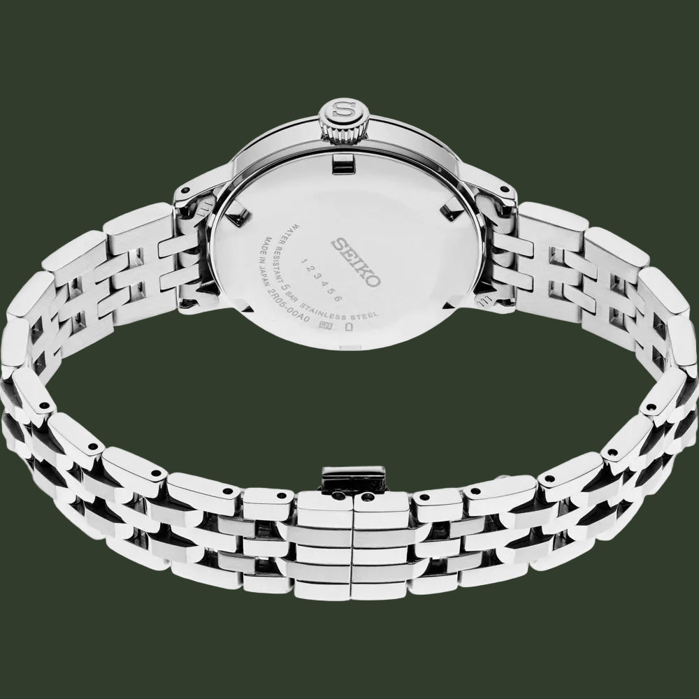 Silver Seiko watch with a metal bracelet on a white background