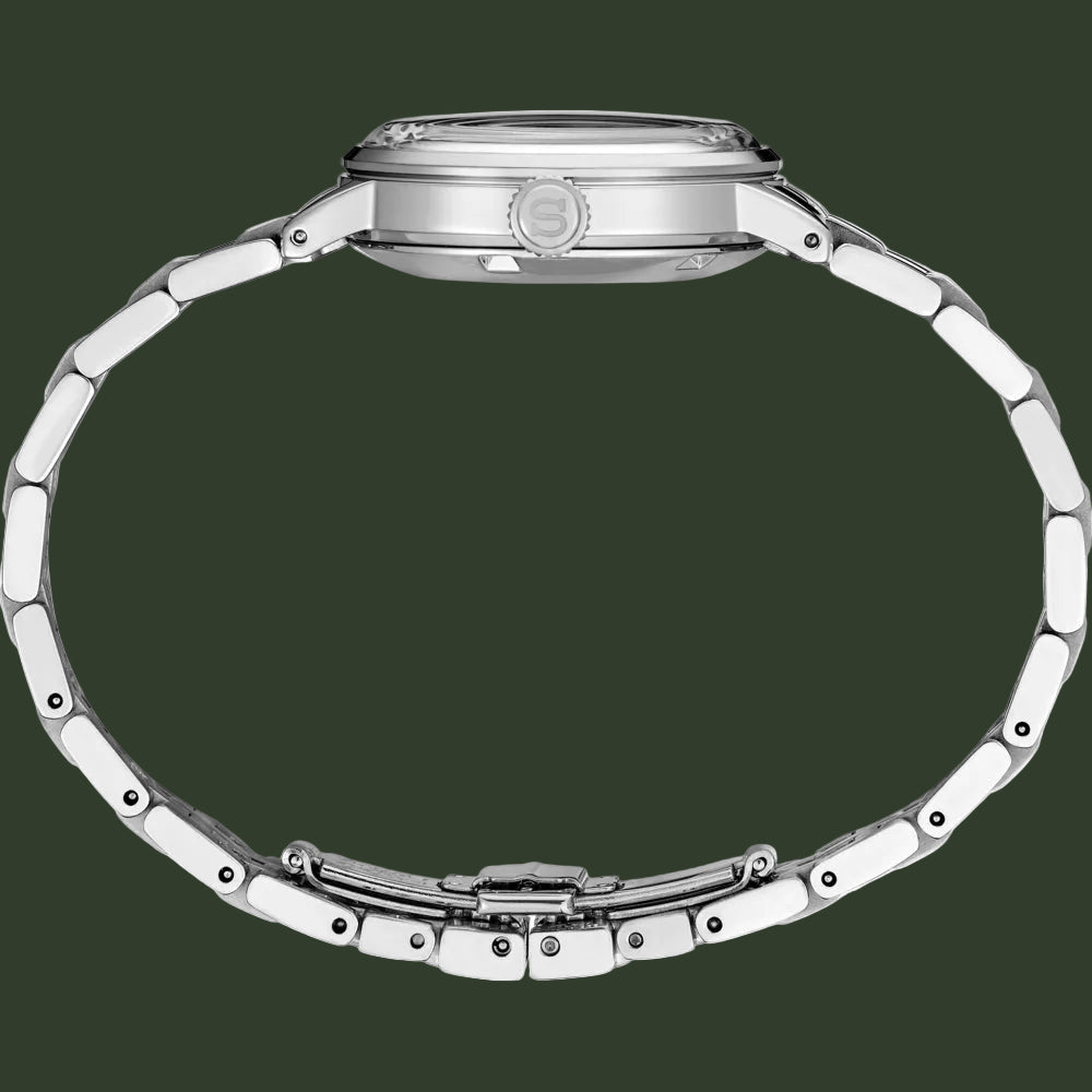 Close-up of a silver watch with a detailed band on a white background