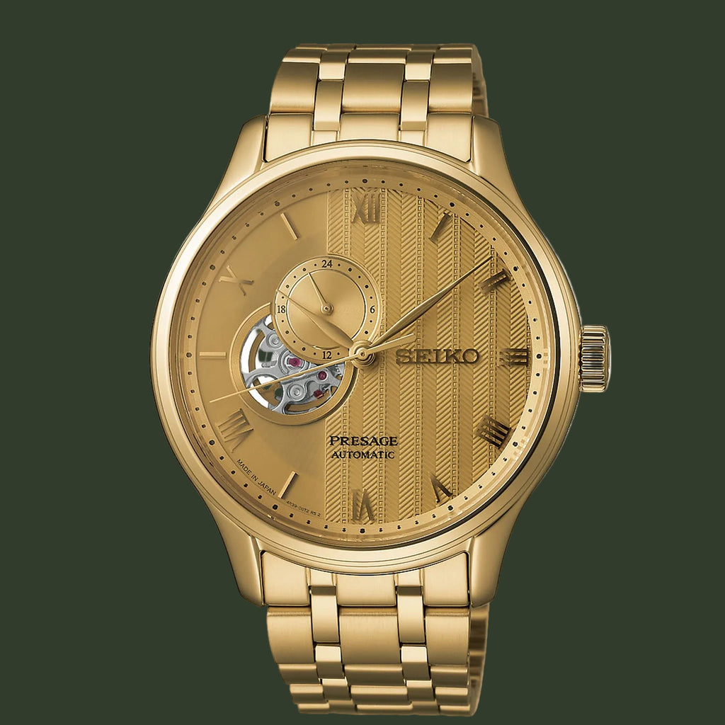 Gold Seiko watch with detailed face on a white background