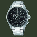 Seiko watch with black dial and silver metal strap on a white background