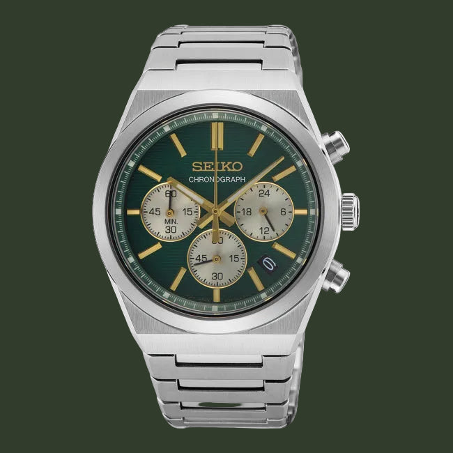 Seiko watch with green face and silver metal strap on white background
